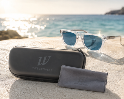 Web Eyewear — Lunettes de Soleil Homme à Monture Transparente et Verres Bleus